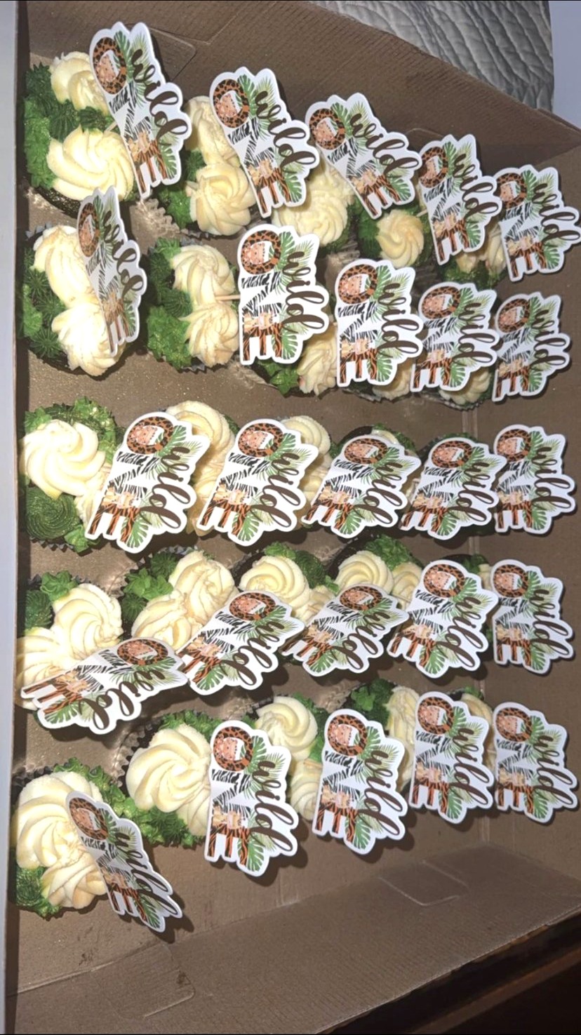 Cupcakes with playful themed decorations