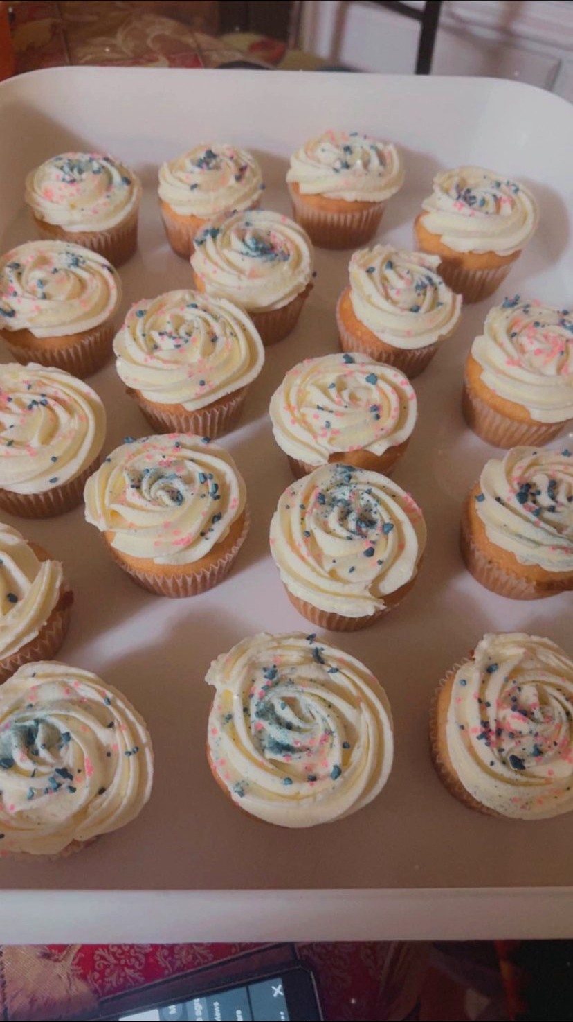 Swirled cupcakes arranged on a tray