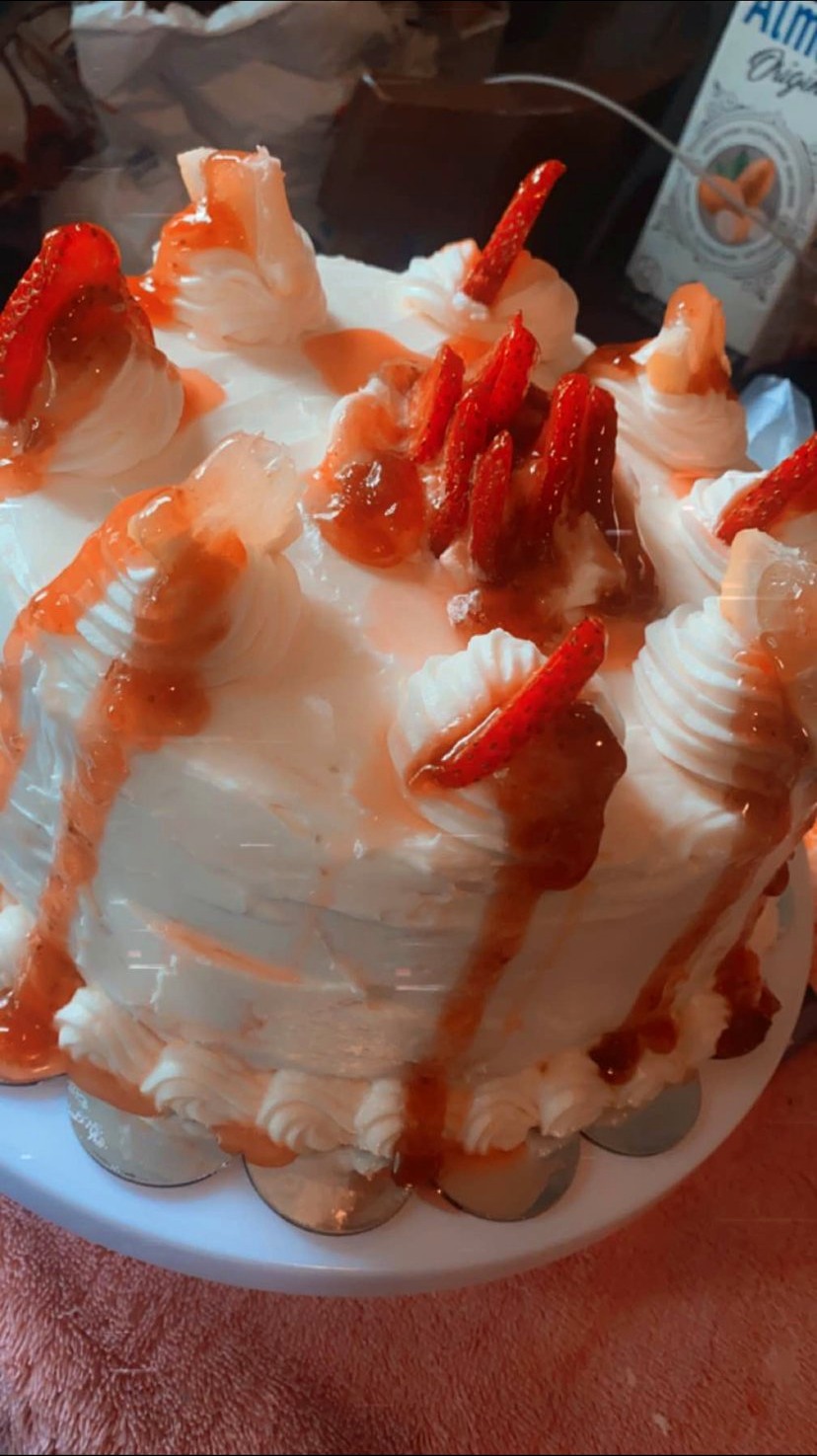 Cake with orange and white frosting